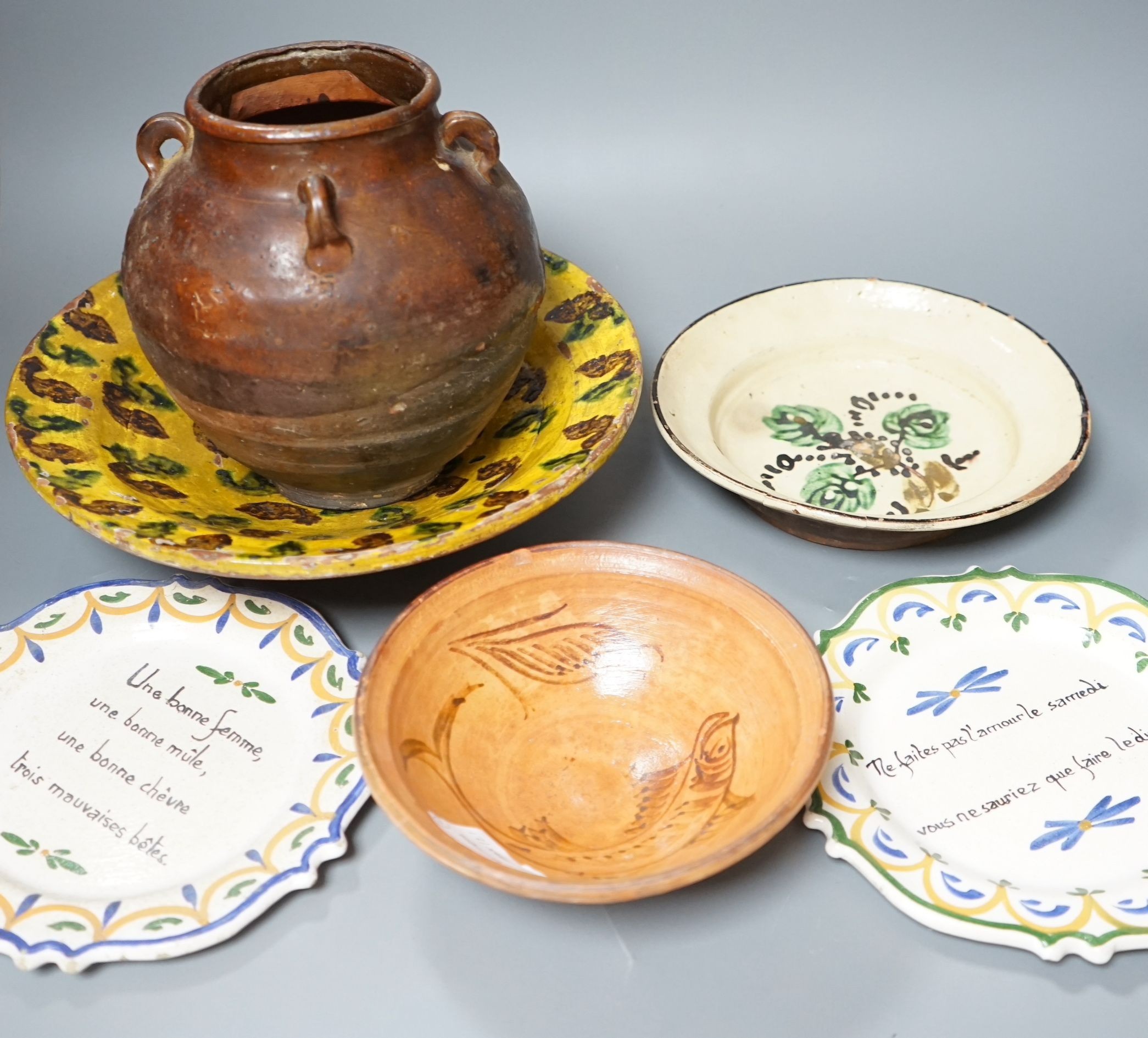 A group of 19th/20th century Continental pottery items to include two sponge ware dishes and a partially glazed jar, largest 20cm, (6)